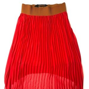New and Chic high low ladies skirt. Bright red color, very pretty.